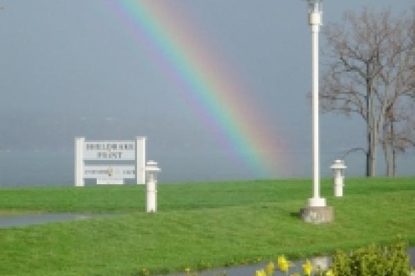 rainbow over sign