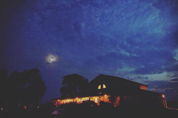 moon over Deer Run Winery building at night
