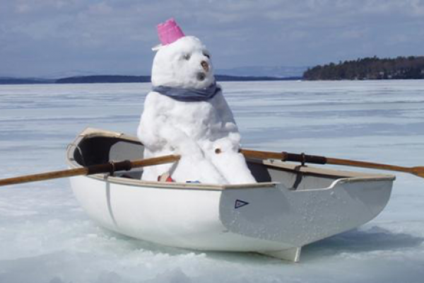 humerous snowman in a boat