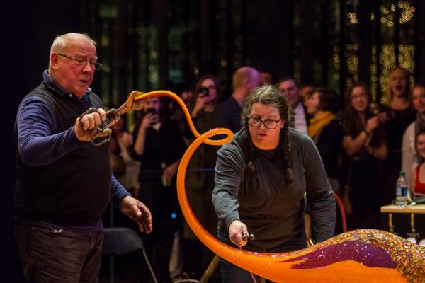 Watch as Lino Tagliapietra shapes molten glass, seemingly effortlessly, into his signature colorful forms right here in Corning.