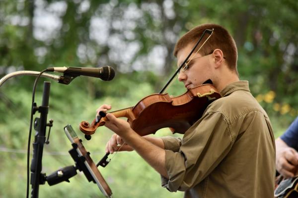 man playing the fiddle