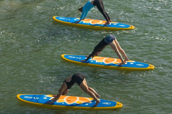 Downward Dog Pose on Paddleboards in Canandaigua Lake