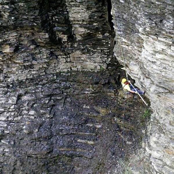 Bill scales a high cliff in Watkins Glen State Park.