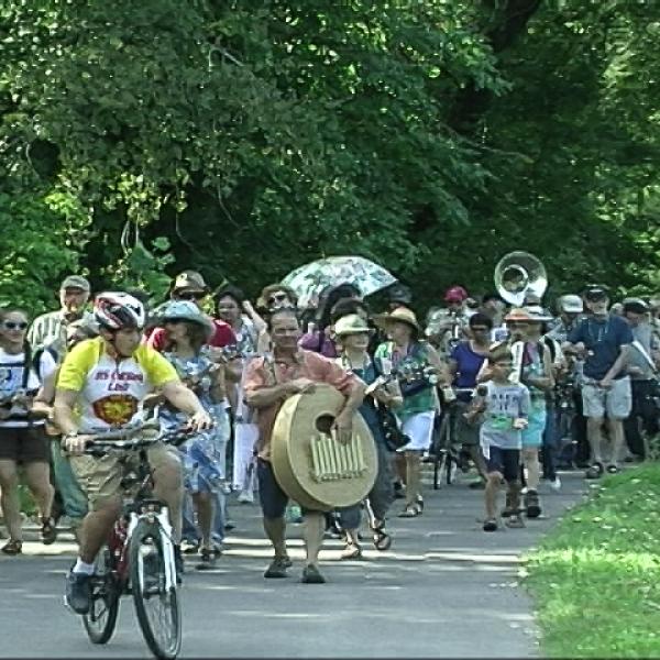 The parade followed the Cayuga Waterfront Trail along Fall Creek in Ithaca.