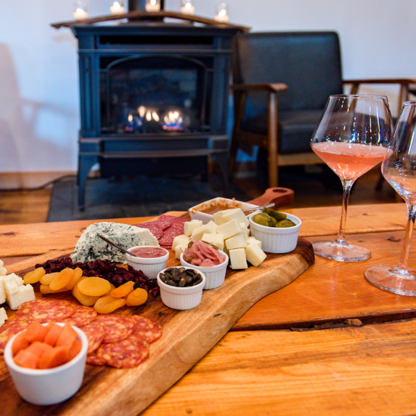 Settle by the fire with an alternating bistro menu & a glass of Barnstormer wine, local beer, or speciality cocktail!