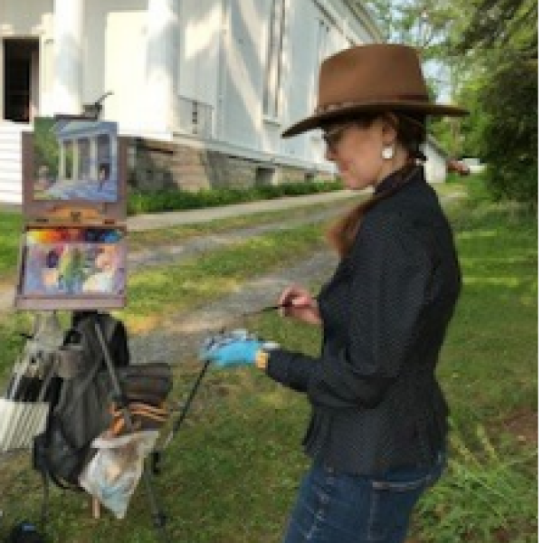 2023 Art Show and Sale: Artist Kari Ruiz paints outside museum.